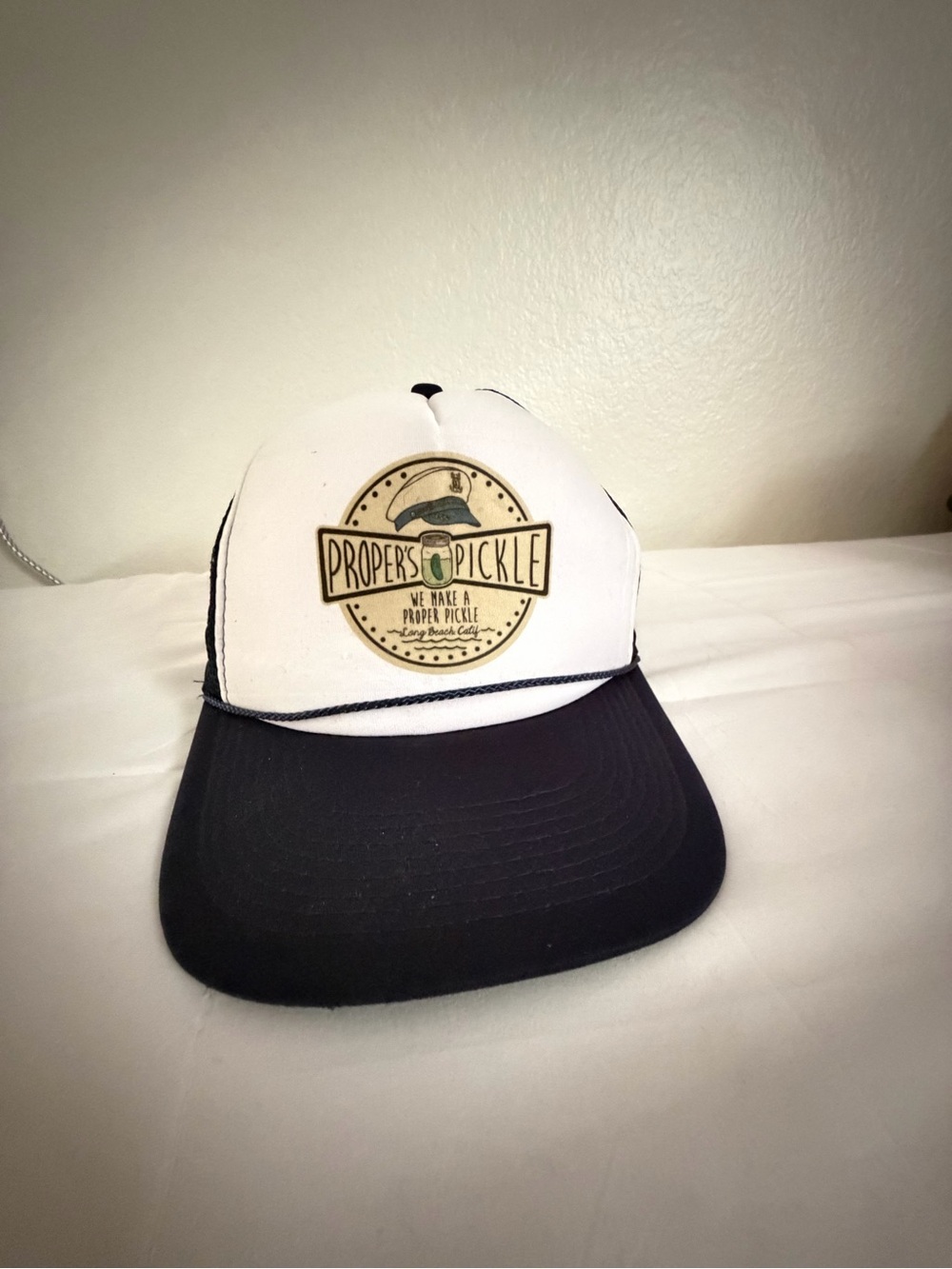 Proper Pickle Logo Trucker Hat in White and Black